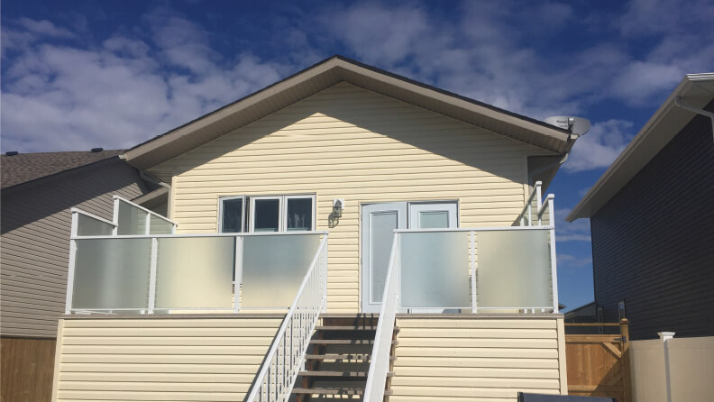 Glass Railing Systems Calgary: Engineering for High-Wind Zones and Mountain Views