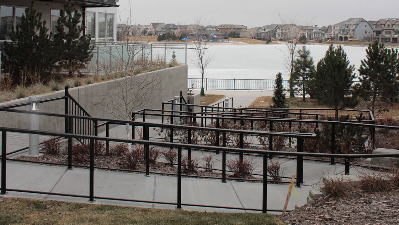 Storefront and Commercial Entrance Accessibility: Combining Ramp and Stair Railings to Meet Code on One Approach